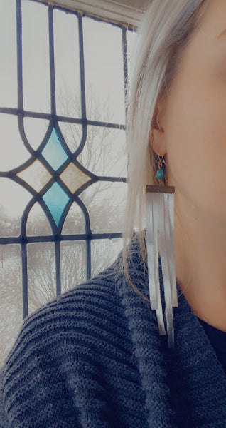 Silver shiny leather fringe earrings